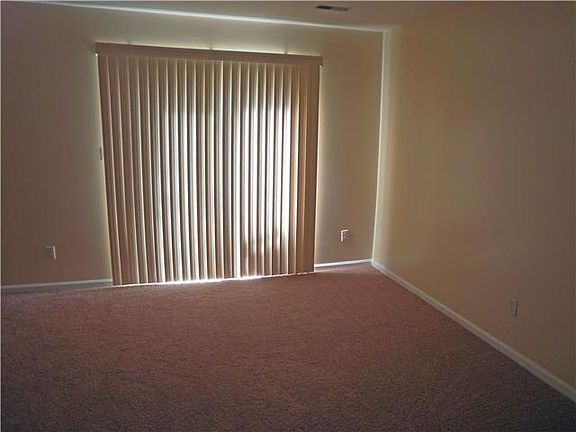 Lower level Family room with slider to yard
