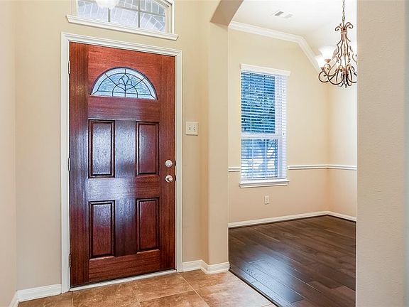 Formal Dining room to the left when you enter, Beautiful Hard Wood Floors.
