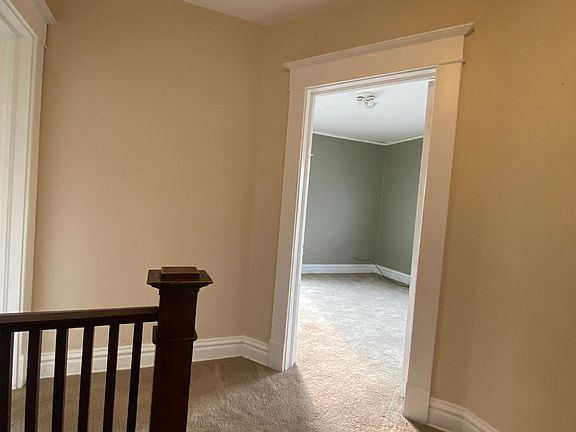 Top of stairs (left)