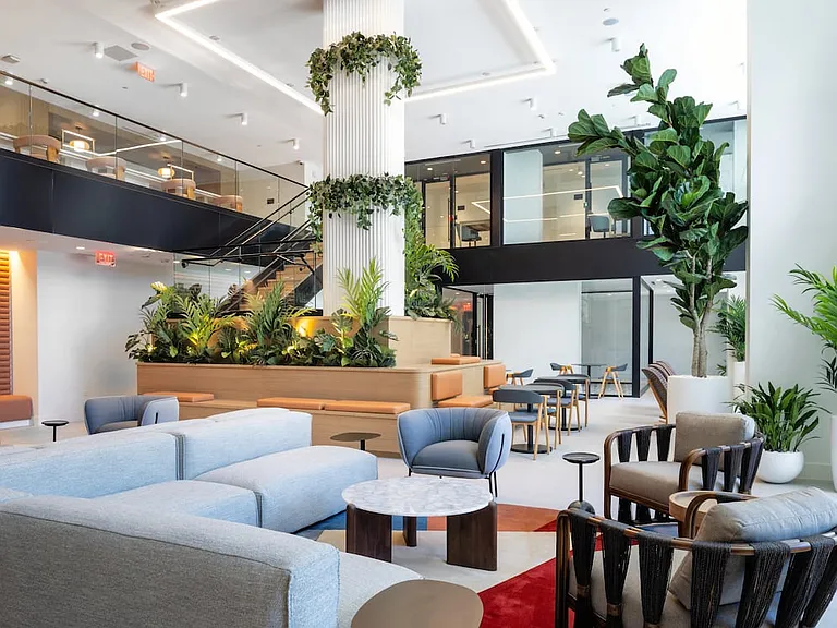 Lower-level resident lounge with multiple seating areas