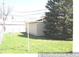 Large completely fenced yard.