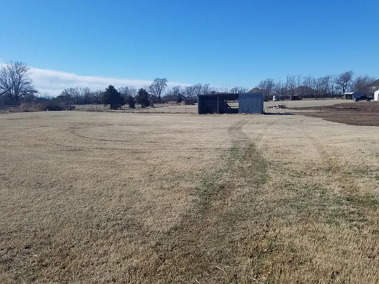 Fenced property behind home