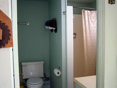 Bath in Garage, shower and toliet