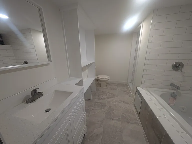 Downstairs bathroom connected to Bedroom