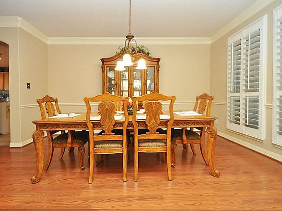 You will enjoy the  Formal Dining Room on those Special occasions when everyone is together.  (That means all the Holidays when YOU have to cook and clean all day while they all sit around and watch TV!)  Yes, those are PLANTATION SHUTTERS you see!