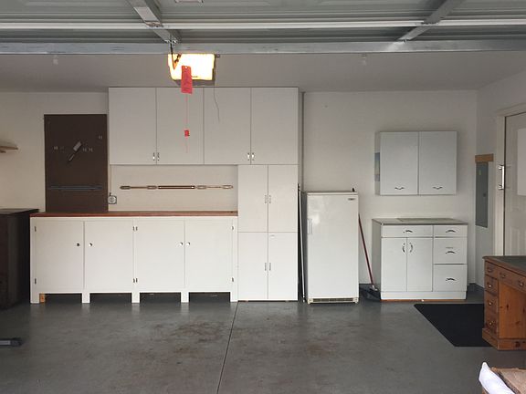 Garage with entry into kitch