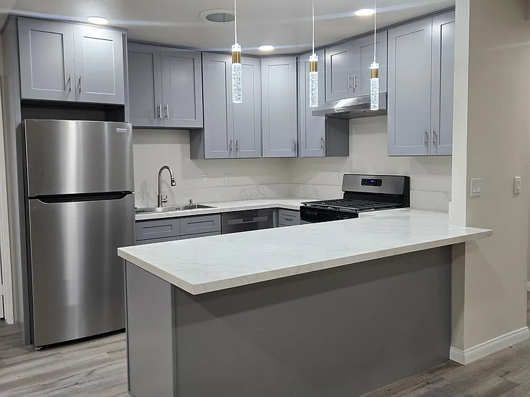 Kitchen with recessed lighting and skylight for daytime