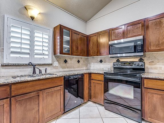 KITCHEN WITH TONS OF STORAGE AND NEWER APPLIANCES