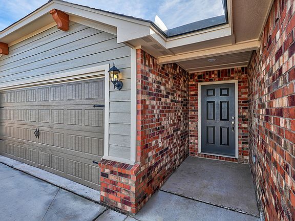 The charming covered entryway of the Sabine.