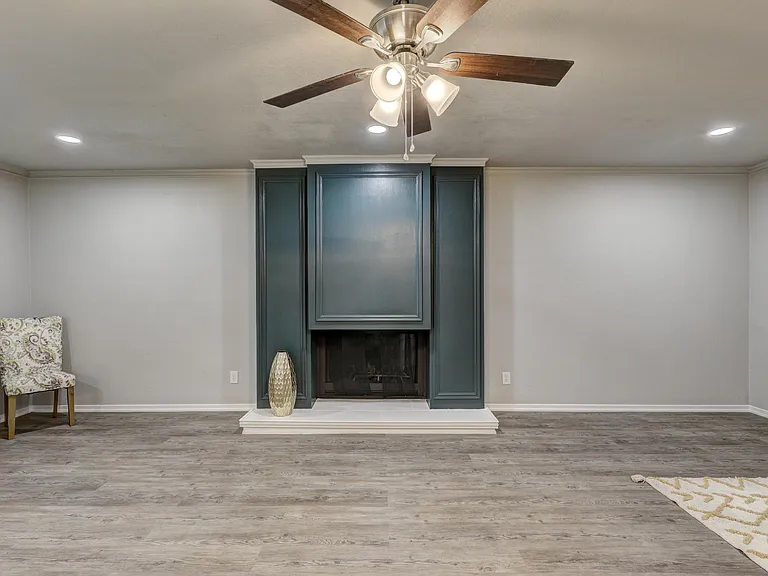 Huge living room with wet bar and patio access.