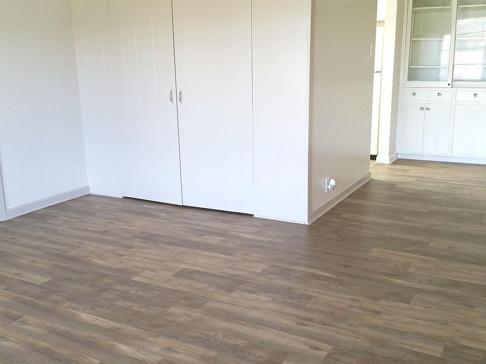Living room with view of dining area and built-in china cabi
