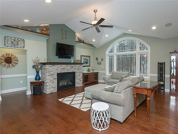 Gorgeous open floor plan allows the main focal point to be the cedar mantle and extra large gas fireplace. Added shelves for add