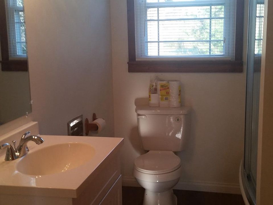 Updated Bathroom with Toilet, Vanity and Shower/Tub Combinat