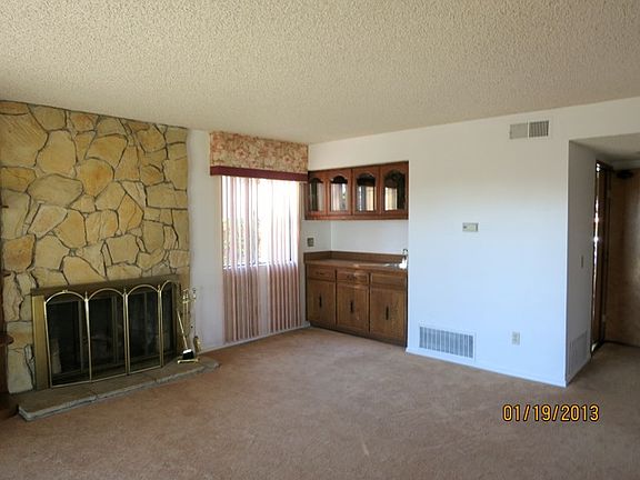 Family room, fireplace, bar