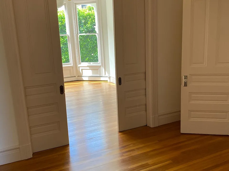 Parlor (or bdrm 2 to living room). Large room fits queen or king bed.