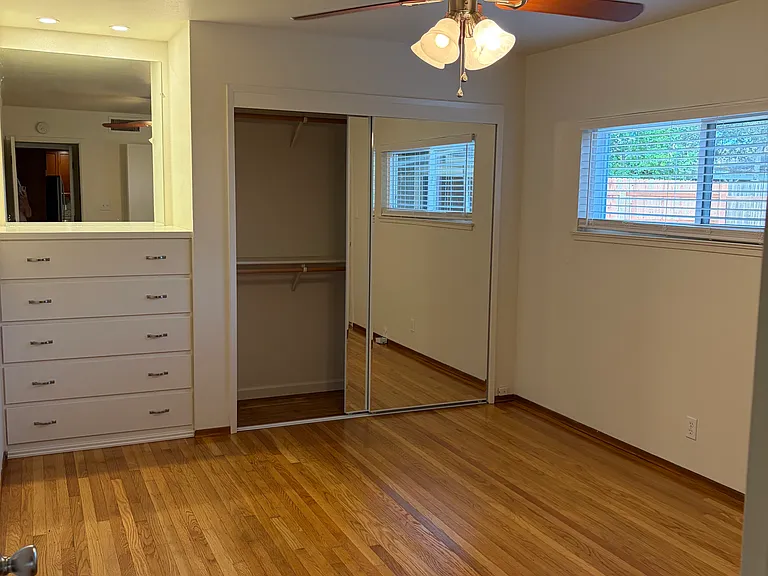 Primary bedroom with door to backyard (separate entrance)
