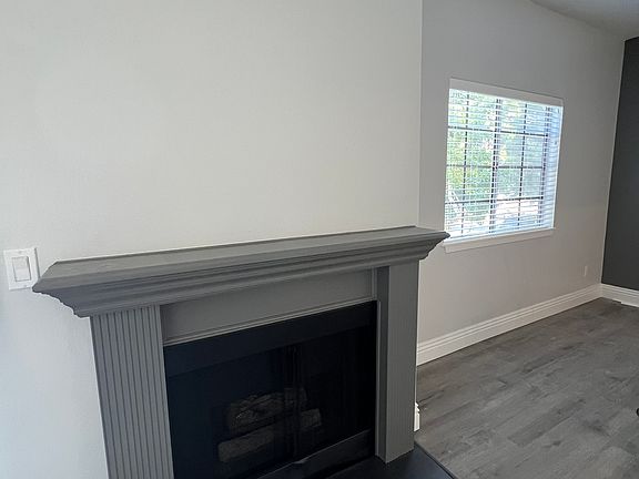 Gas Fireplace and Dining Room Window