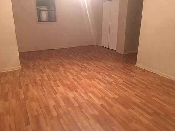 large master bedroom with his/her closets