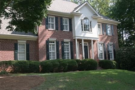 Three sided brick on hill.