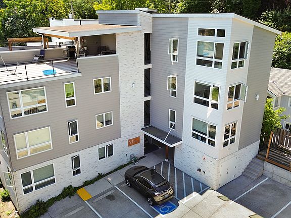 3 apartments on each side and off street parking