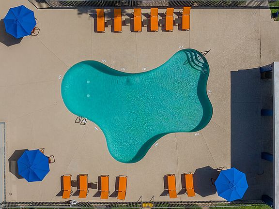 Aerial View of Swimming Pool with Pool Furniture