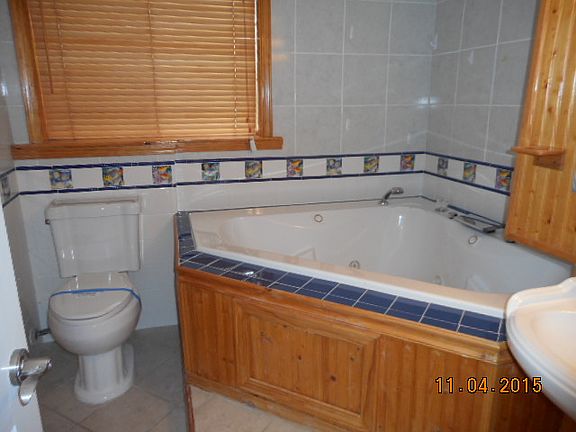 JETTED TUB IN BATHROOM