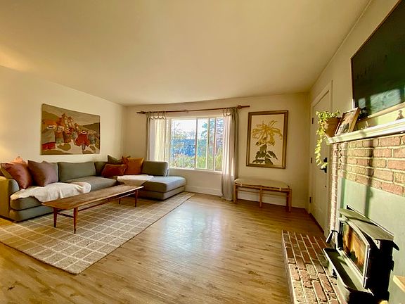Spacious Living Room with New Wood Burning Stove.