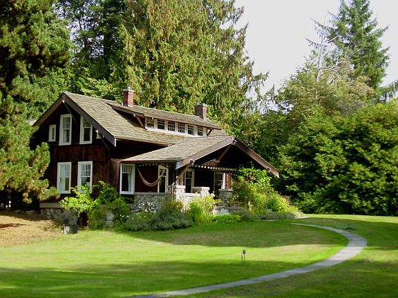 Authentic Craftsman surrounded by beautiful lawns