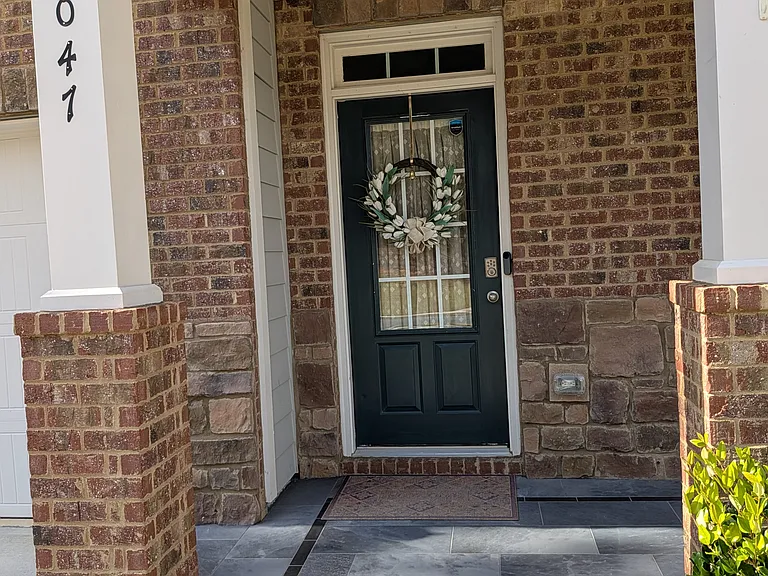 Entrance with Full Sized Tiled Porch
