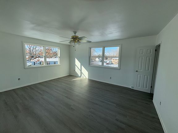 Open living room with brand new windows