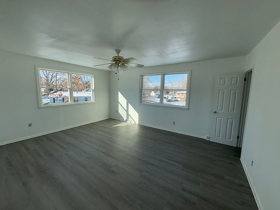 Open living room with brand new windows