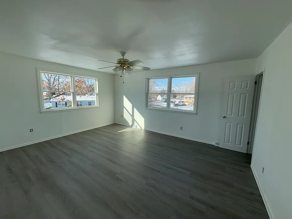 Open living room with brand new windows