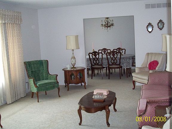 Living room attached to formal dining room