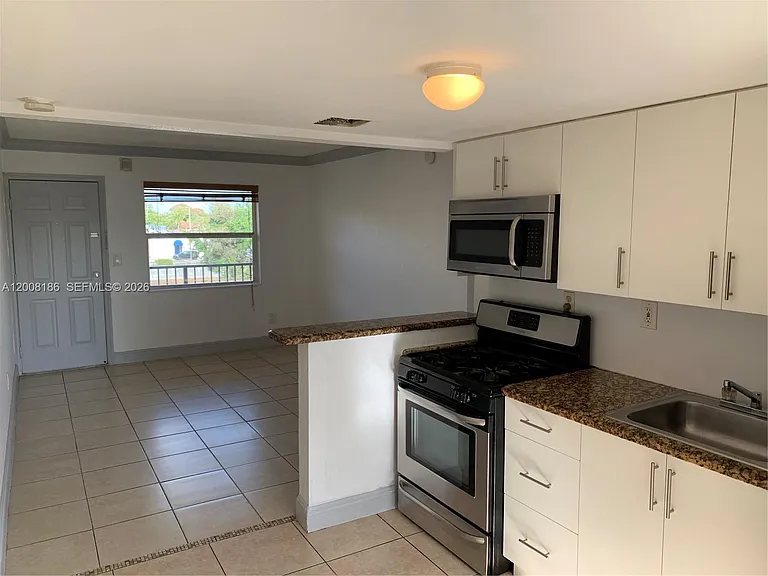 241 S Royal Poinciana Blvd #310 — Photo 1