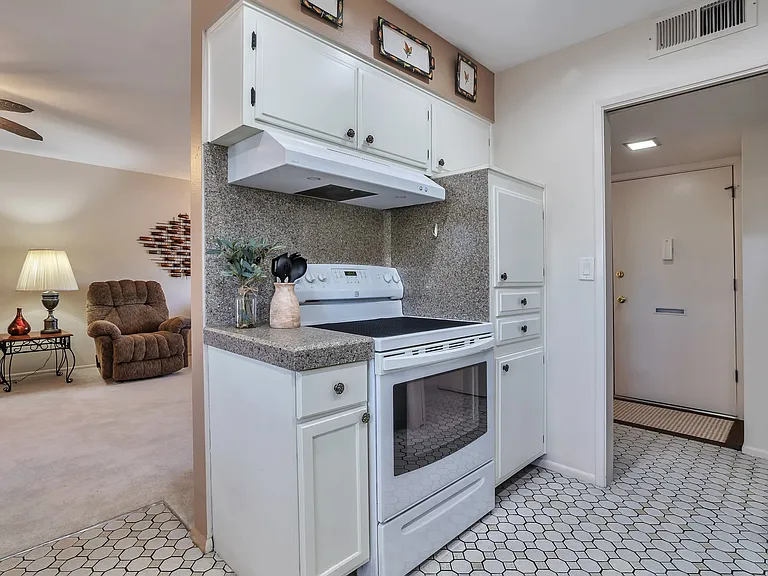 Cabinet pull-outs for easy cookware access.