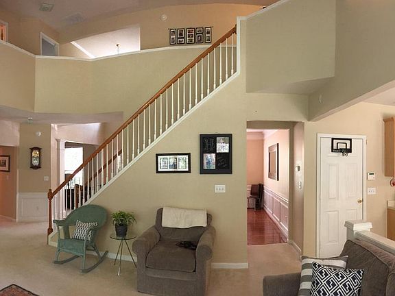 2 story open living area with large eat in kitchen