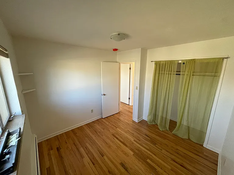 Smaller main floor front bedroom