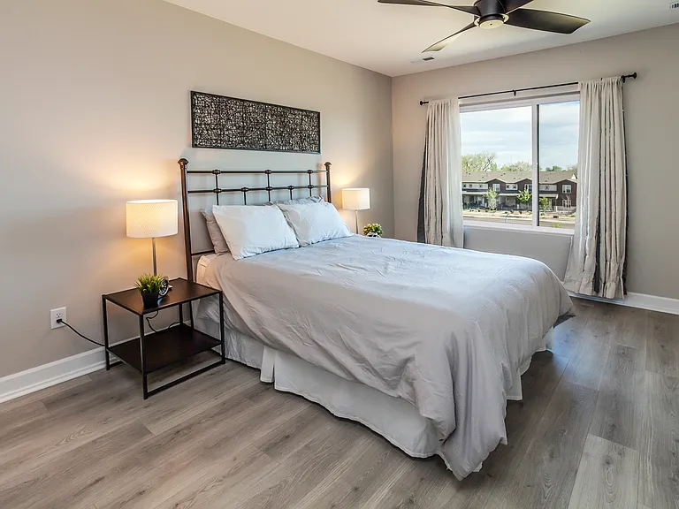 Top-level master suite with mountain and city views.