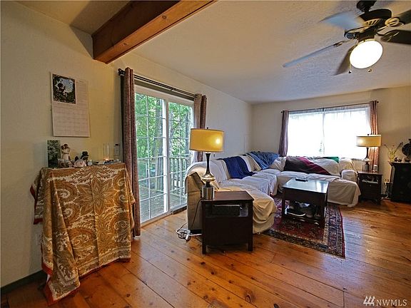 So much light from those big windows, slider off to the side deck.