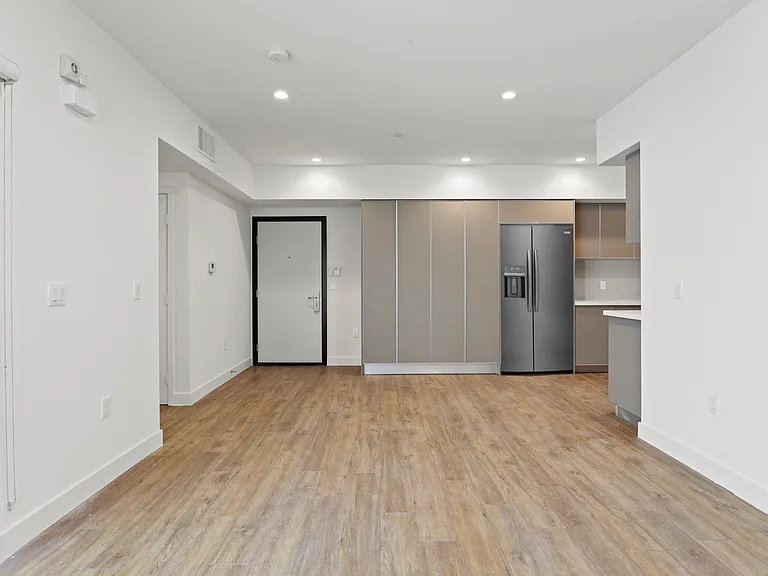 Front Entrance and Open-Concept Kitchen and Dining Areas