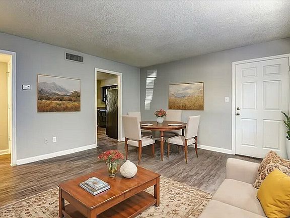 Step into a cozy and stylish living space perfect for relaxation and entertaining.
