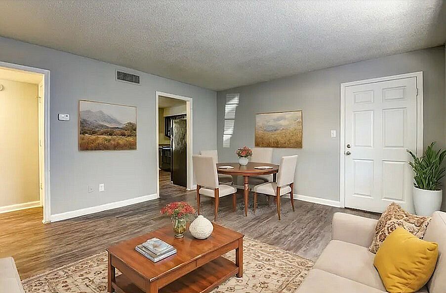 Step into a cozy and stylish living space perfect for relaxation and entertaining.