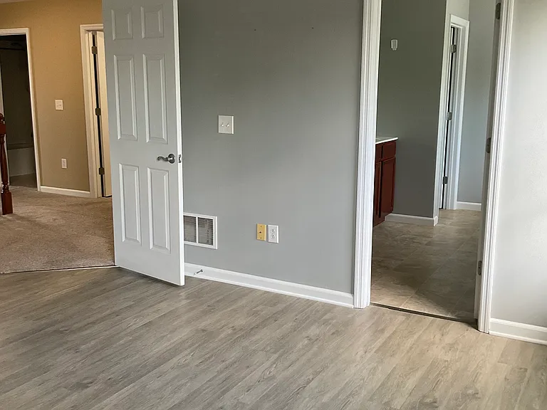 Master bedroom with vaulted ceiling