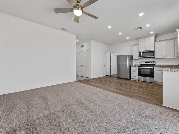 The kitchen comes with a full suite of energy-efficient appliances!