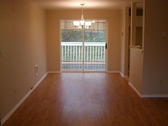Dining room showing sliding glass door to deck.