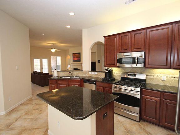 The large island kitchen is a chef's dream and great for ent