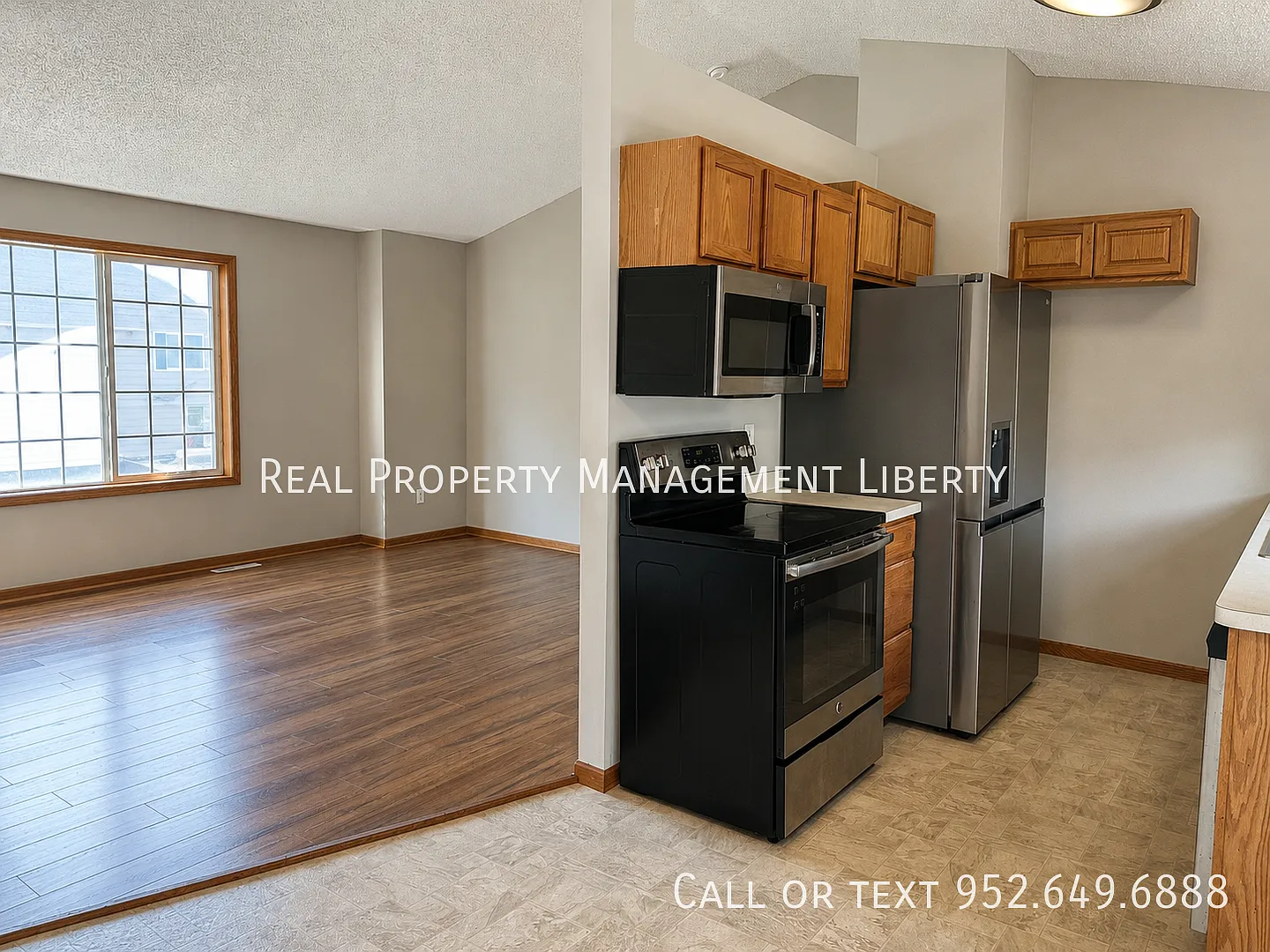 Spacious 2-Bedroom Shakopee Townhome with 2-Car Garage, Private Deck and Walkout Lower Level — Photo 2