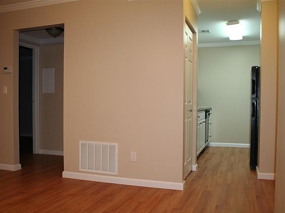 pic taken in eating area of kitchen and hall to bath/bedroom