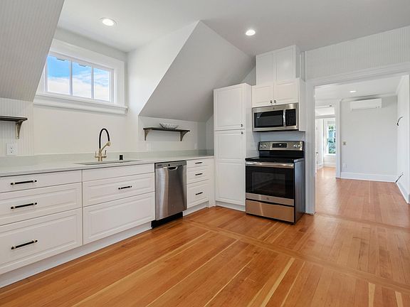 Huge Kitchen with quartz countertops and stainless appliances
