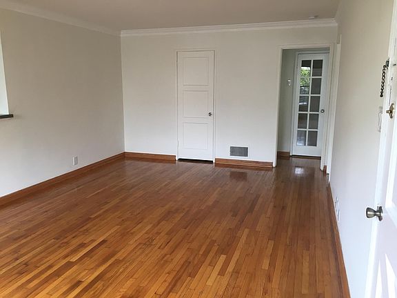Huge living room, coat closet, additional closet (can't see 